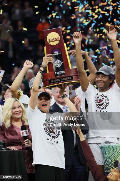 Head coach Dawn Staley of the South Carolina Gamecocks holds up the national championship trophy after defeating the UConn Huskies 64-49 during the...