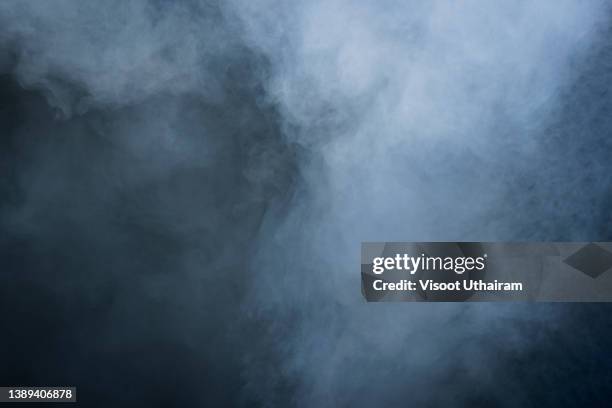 abstract smoke moves on a black background,fog, dust,white fog and mist effect. - magic swirl stock pictures, royalty-free photos & images