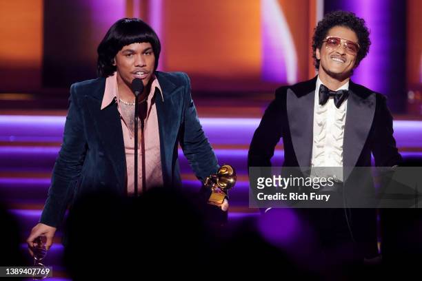 Anderson .Paak and Bruno Mars of Silk Sonic accept the Record Of The Year award for ‘Leave The Door Open’ onstage during the 64th Annual GRAMMY...