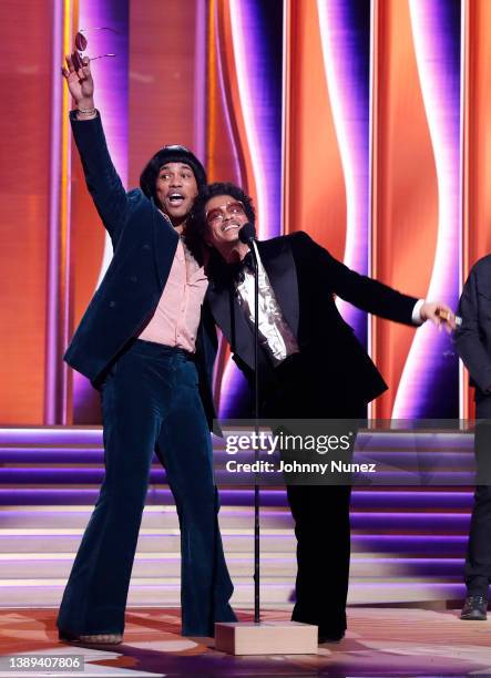 Anderson .Paak and Bruno Mars of Silk Sonic accept the Record Of The Year award for ‘Leave The Door Open’ onstage during the 64th Annual GRAMMY...