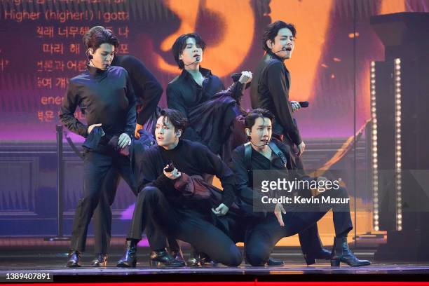 Jimin, Jungkook, Suga, J-Hope, and V of BTS perform onstage during the 64th Annual GRAMMY Awards at MGM Grand Garden Arena on April 03, 2022 in Las...