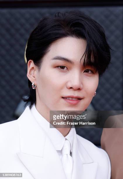 Suga of BTS attends the 64th Annual GRAMMY Awards at MGM Grand Garden Arena on April 03, 2022 in Las Vegas, Nevada.