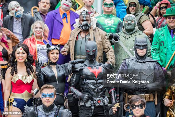 Group of DC Comics cosplayers pose for photos at WonderCon 2022 Day 3 at Anaheim Convention Center on April 03, 2022 in Anaheim, California.