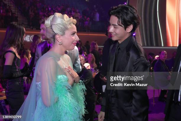 Lady Gaga and V of BTS during the 64th Annual GRAMMY Awards at MGM Grand Garden Arena on April 03, 2022 in Las Vegas, Nevada.