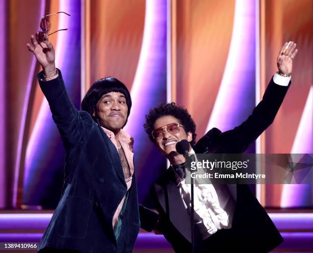 Anderson .Paak and Bruno Mars of Silk Sonic accept Record Of The Year award for ‘Leave The Door Open’ onstage during the 64th Annual GRAMMY Awards at...