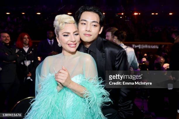 Lady Gaga and V of BTS attend the 64th Annual GRAMMY Awards at MGM Grand Garden Arena on April 03, 2022 in Las Vegas, Nevada.