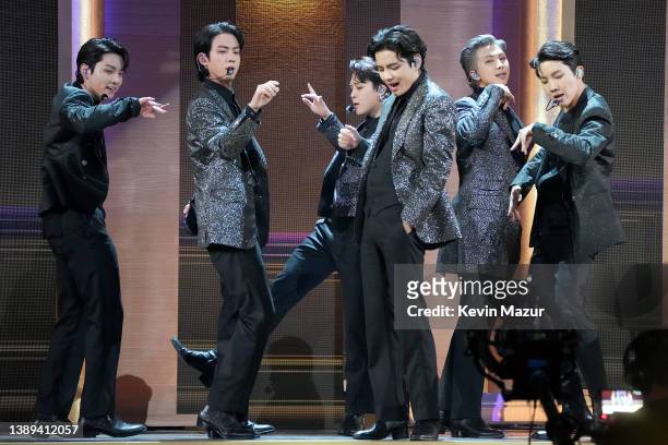 Jungkook, Jin, Jimin, V, RM, and J-Hope of BTS perform onstage during the 64th Annual GRAMMY Awards at MGM Grand Garden Arena on April 03, 2022 in...