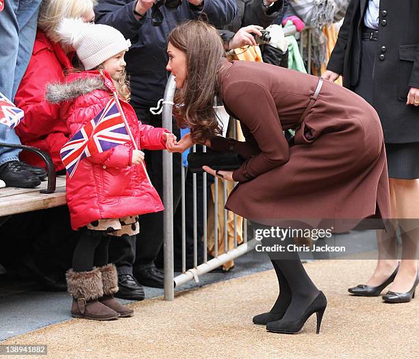 Catherine, Duchess of Cambridge meets a young girl as she visits Alder Hey Children's NHS Foundation Trust on February 14, 2012 in Liverpool,...