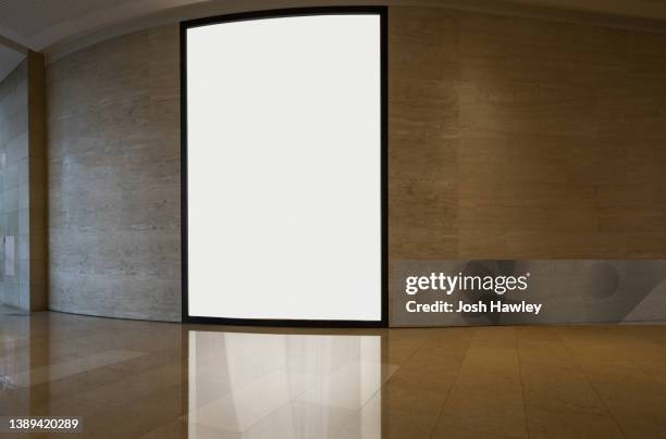 blank billboard on the wall - airport poster stock pictures, royalty-free photos & images