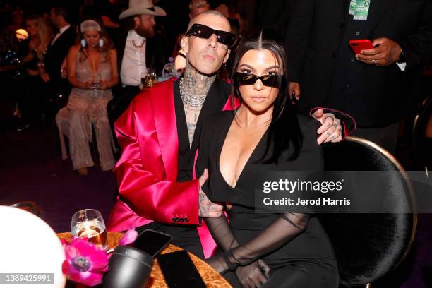 Travis Barker and Kourtney Kardashian toast to the 64th Annual GRAMMY Awards with Grey Goose vodka on April 03, 2022 in Las Vegas, Nevada.