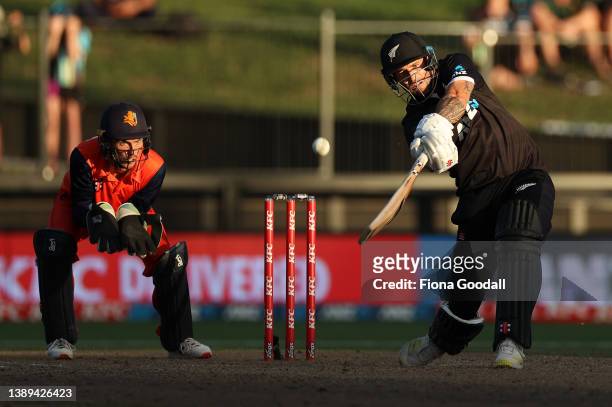Doug Bracewell of New Zealand plays a shot with wicket keeper Scott Edwards of the Netherlands during the third and final one-day international...