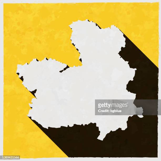 castilla-la mancha map with long shadow on textured yellow background - la mancha 幅插畫檔、美工圖案、卡通及圖標