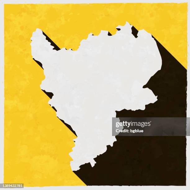 east midlands map with long shadow on textured yellow background - east stock illustrations