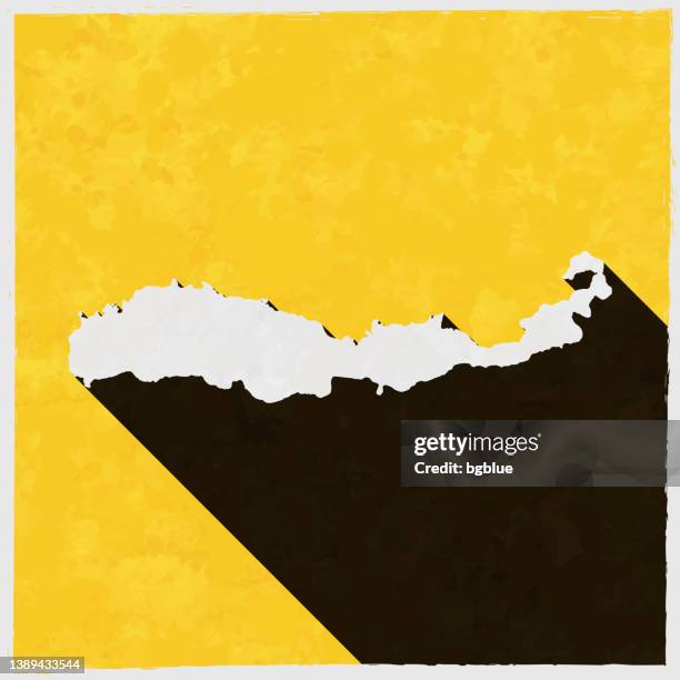 flores map with long shadow on textured yellow background - flores stock illustrations