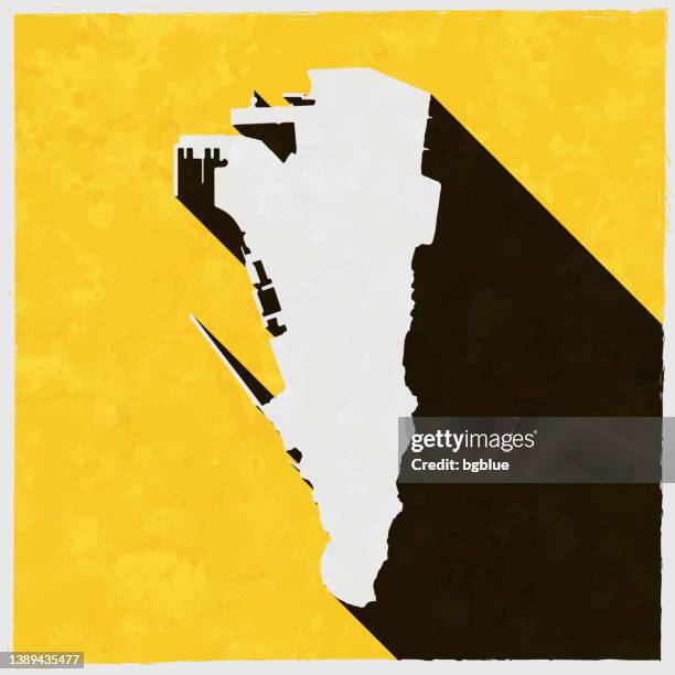 gibraltar map with long shadow on textured yellow background - gibraltar stock illustrations