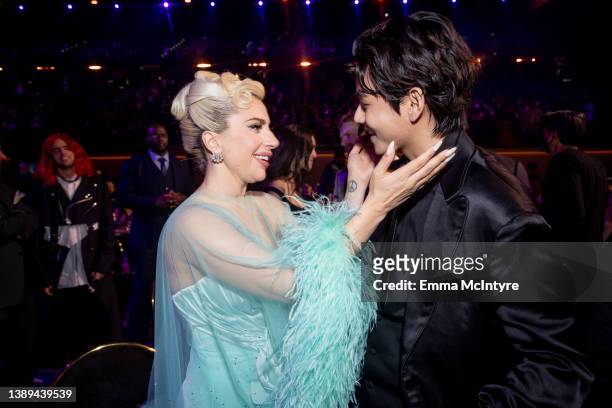 Lady Gaga and V of BTS attend the 64th annual GRAMMY awards on April 03, 2022 in Las Vegas, Nevada.