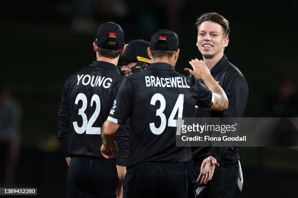 Michael Bracewell of New Zealand takes the wicket of Logan van Beek of the Netherlands during the third and final one-day international cricket match...