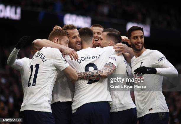 Harry Kane of Tottenham Hotspur celebrates with Matt Doherty of Tottenham Hotspur after he scored a goal during the Premier League match between...