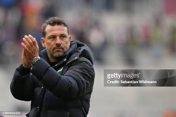 Head coach Markus Weinzierl of FC Augsburg applauds after the Bundesliga match between FC Augsburg and VfL Wolfsburg at WWK-Arena on April 03, 2022...