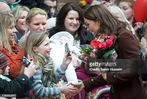 Catherine, Duchess of Cambridge greets wellwishers as she visits Alder Hey Children's NHS Foundation Trust on February 14, 2012 in Liverpool, England.