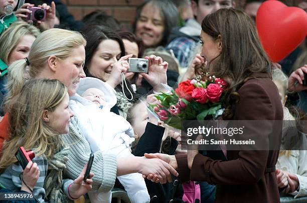 Catherine, Duchess of Cambridge greets well wishers as she visits Alder Hey Children's NHS Foundation Trust on February 14, 2012 in Liverpool,...