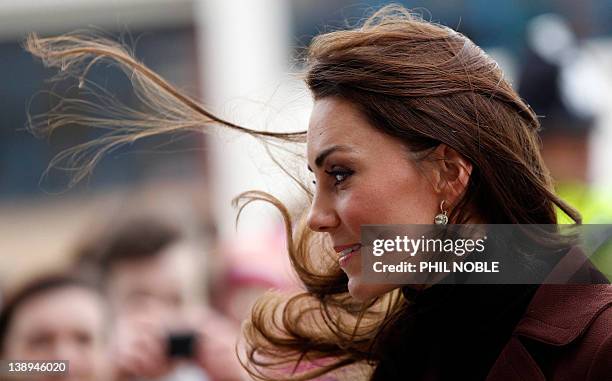 Britan's Catherine, the Duchess of Cambridge, smiles during a visit to Alder Hey Children's Hospital in Liverpool, north-west England, on February...