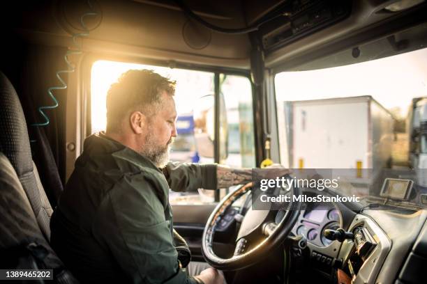 man driving a truck - tired driver stock pictures, royalty-free photos & images