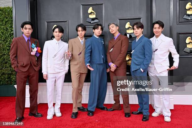 Suga, Jin, Jungkook, RM, Jimin and J-Hope of BTS attends the 64th Annual GRAMMY Awards at MGM Grand Garden Arena on April 03, 2022 in Las Vegas,...