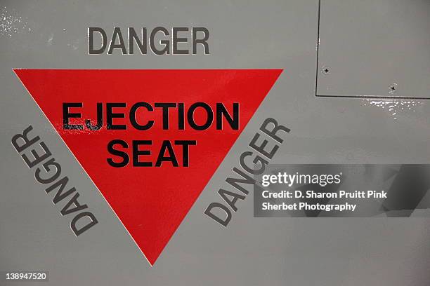 danger ejection seat sign - ejector seat stock pictures, royalty-free photos & images