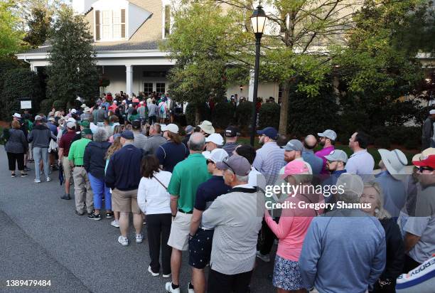 Patrons queue for the golf shop during a practice round prior to the Masters at Augusta National Golf Club on April 04, 2022 in Augusta, Georgia.