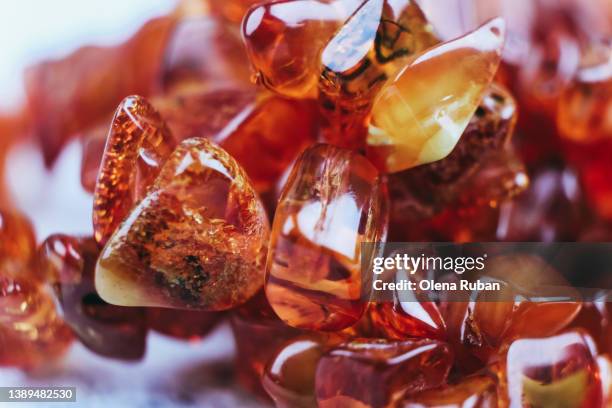 shining amber stones. - amber stockfoto's en -beelden