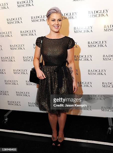 Kelly Osbourne poses backstage at the Badgley Mischka Fall 2012 fashion show during Mercedes-Benz Fashion Week at The Theatre at Lincoln Center on...