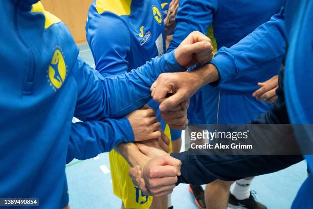 Players stand together after a training session of the Ukrainian national Handball team on April 04, 2022 in Grosswallstadt, Germany.