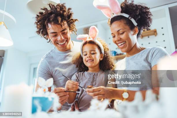 close up of a loving couple preparing for an easter - easter concept stock pictures, royalty-free photos & images