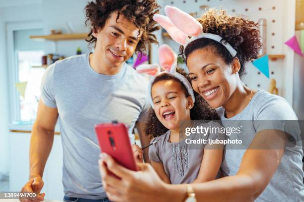 easter is a special time to celebrate with family - easter family stock pictures, royalty-free photos & images