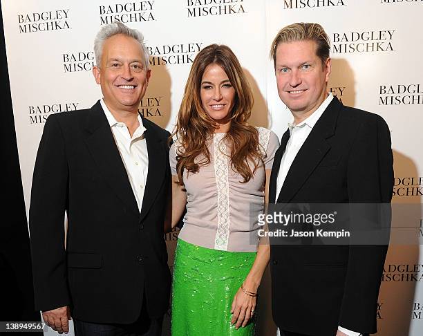 Designer Mark Badgley, TV personality Kelly Bensimon and designerJames Mischka pose backstage at the Badgley Mischka Fall 2012 fashion show during...