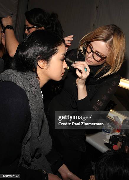 Model backstage at the Badgley Mischka Fall 2012 fashion show during Mercedes-Benz Fashion Week at the The Theatre at Lincoln Center on February 14,...