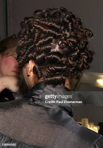 Model backstage at the Badgley Mischka Fall 2012 fashion show during Mercedes-Benz Fashion Week at the The Theatre at Lincoln Center on February 14,...