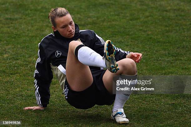 Babett Peter warms up during a training session of the German women's national football team at Buca Arena on February 14, 2012 in Izmir, Turkey.
