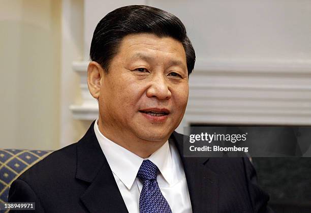 Xi Jinping, vice president of China, makes brief remarks to reporters before a meeting with U.S. Vice President Joe Biden and other officials in the...