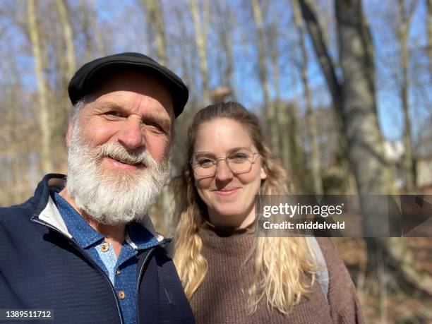 father with his twin pregnant daughter - long term stock pictures, royalty-free photos & images