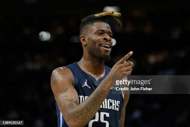 Reggie Bullock of the Dallas Mavericks reacts toward the Bucks bench during the second half of a game at Fiserv Forum on April 03, 2022 in Milwaukee,...