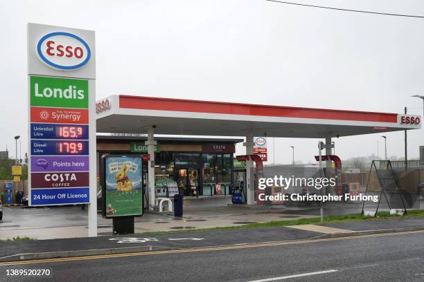 General view of an Esso petrol station on the A556 at Tabley selling unleaded fuel for 165.9p a litre and diesel for 179.9p a litre on on April 04,...