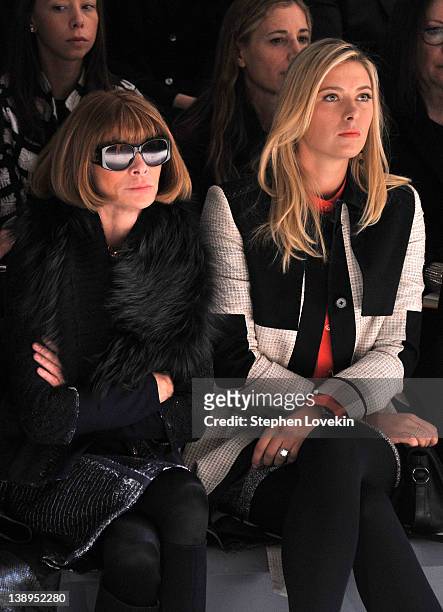 Editor-in-Chief of Vogue, Anna Wintour and professional tennis player Maria Sharapova attend the Vera Wang Fall 2012 fashion show during...