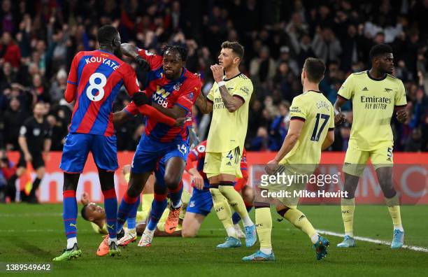 Jean-Philippe Mateta of Crystal Palace celebrates with Cheikhou Kouyate after scoring their side's first goal during the Premier League match between...