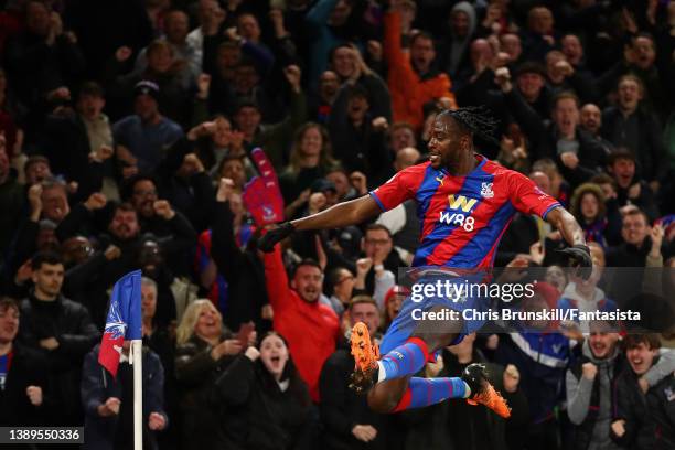 Jean-Philippe Mateta of Crystal Palace celebrates scoring the opening goal during the Premier League match between Crystal Palace and Arsenal at...