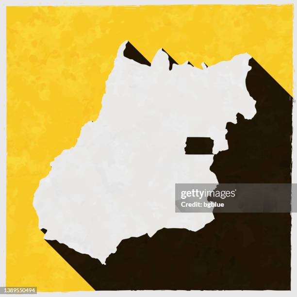 bildbanksillustrationer, clip art samt tecknat material och ikoner med goias map with long shadow on textured yellow background - goias