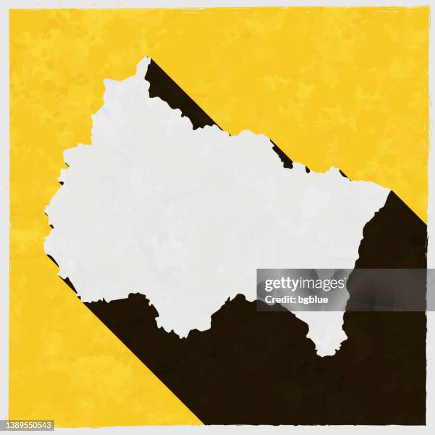 grand est map with long shadow on textured yellow background - strasbourg stock illustrations