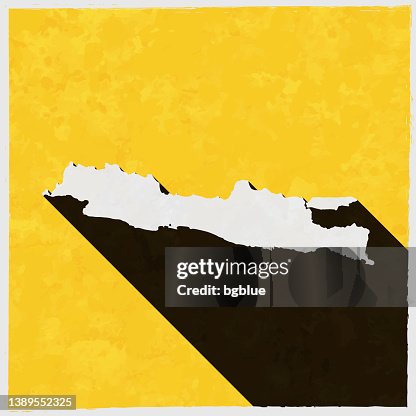 Java map with long shadow on textured yellow background Java map with long shadow on textured yellow background
