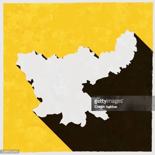 stockillustraties, clipart, cartoons en iconen met jharkhand map with long shadow on textured yellow background - jharkhand